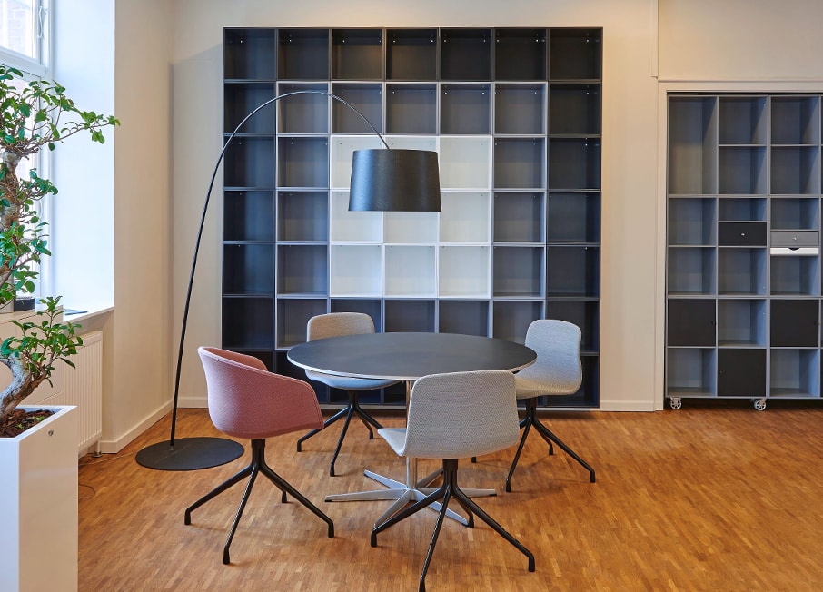 Office space interior contaning modern shelf units and funiture landscape